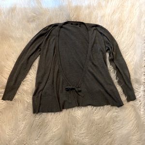 Gray Daisy Fuentes sweater and size Medium.